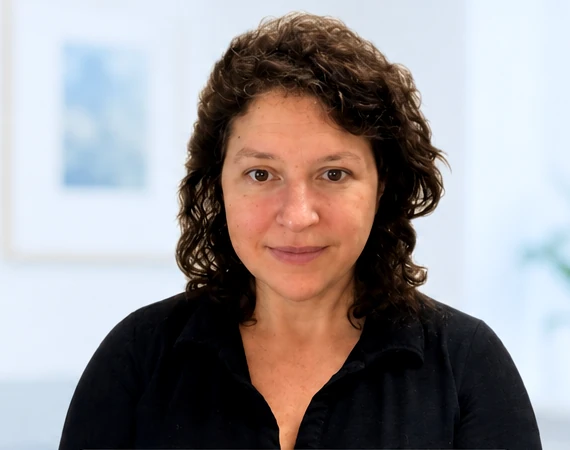 Katie Yeadon, Consultant Colorectal Surgeon, looking directly at the camera
